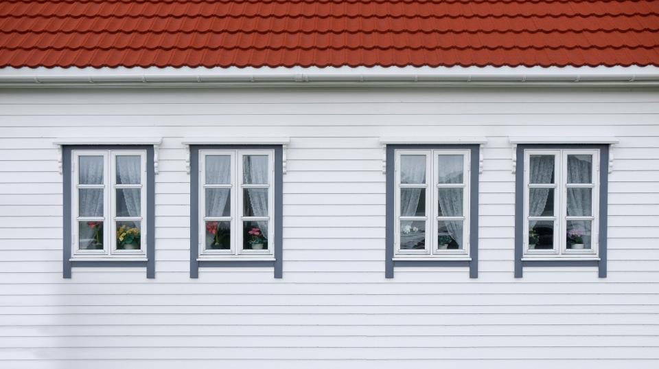 House exterior with white framed windows